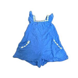 Blue romper with white flower details